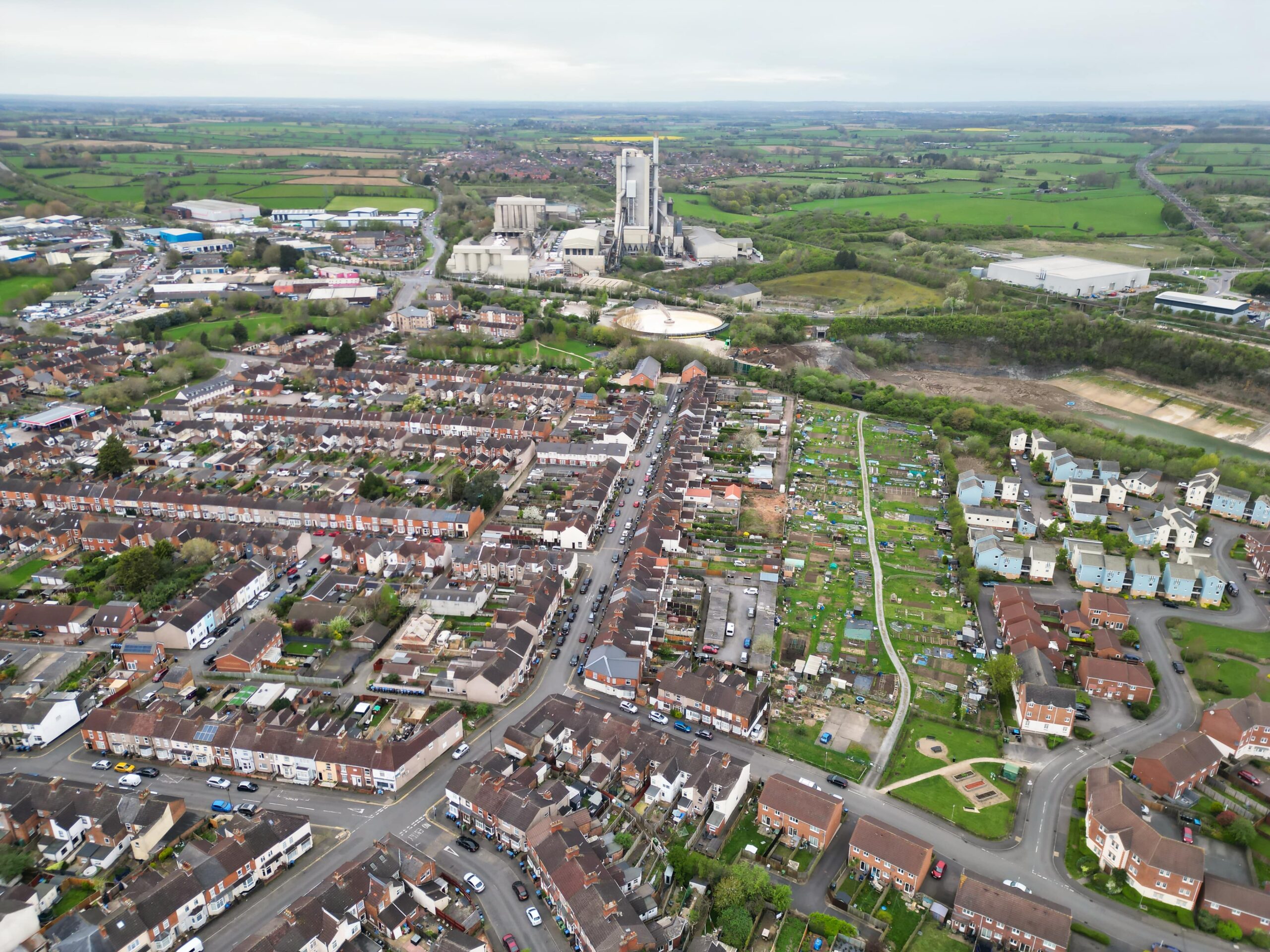 Downtown and Central Rugby City of Warwickshire, England Great Britain. Aerial View Was Captured with Drone's Camera During Mostly Cloudy and Rainy Day on April 8th, 2024 from Medium High Altitude